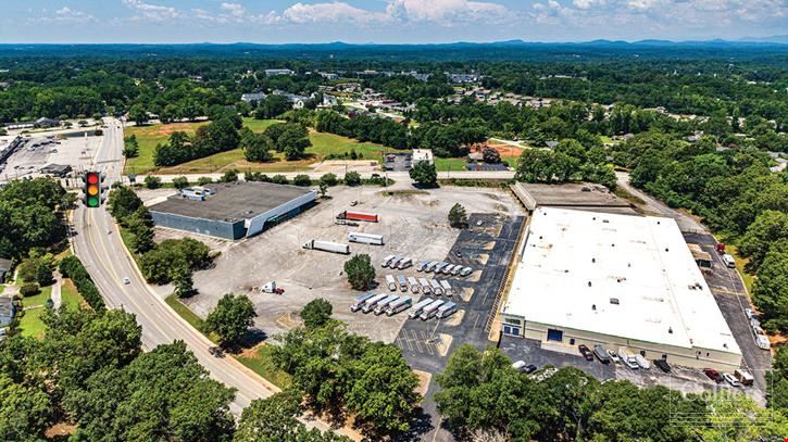 ±44,000-SF and ±25,600-SF Buildings on ±10.83 Acres at a Signalized Intersection
