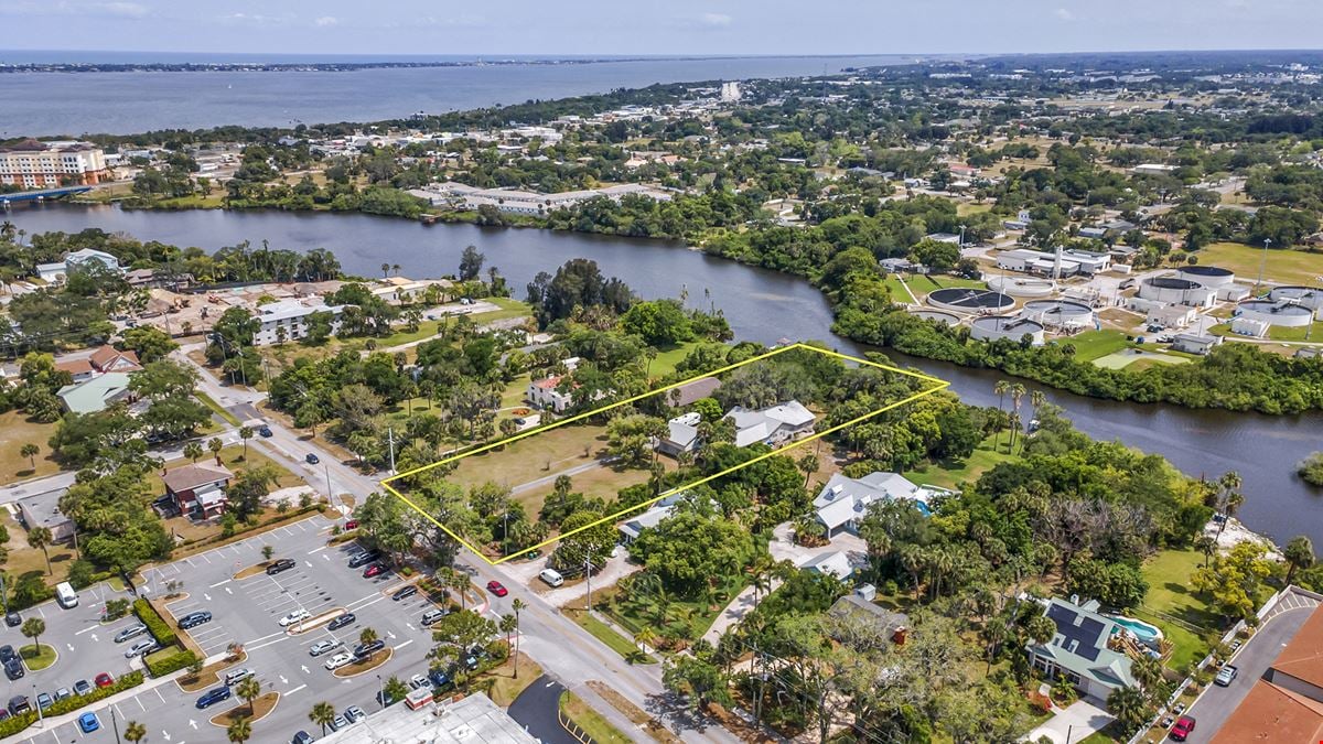 THE 2.08 ACRES OF MULTI-FAMILY LAND IMPROVED WITH SINGLE-FAMILY HOMES