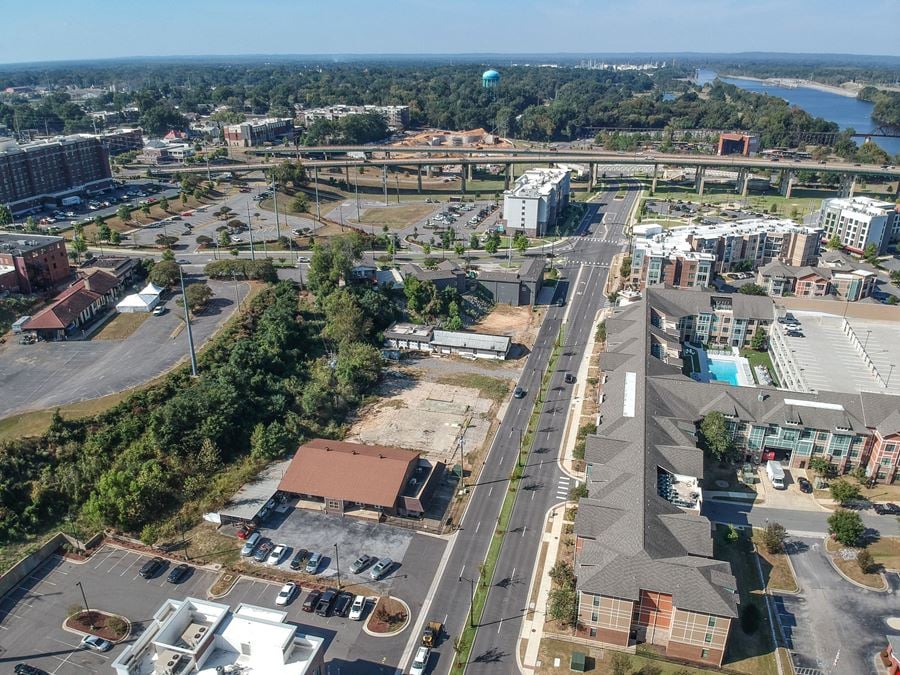 Prime Riverfront District Land + Building