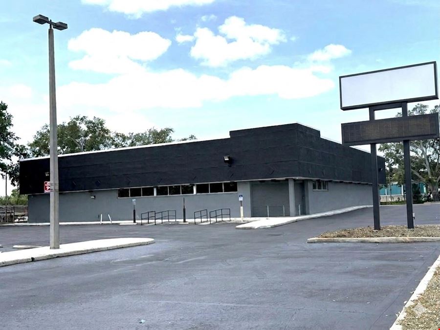 PREMIER TAMPA SHOWROOM- 13,296 SF Freestanding Building 1.42 ACRES  Signalized corner  LED Billboard Signage