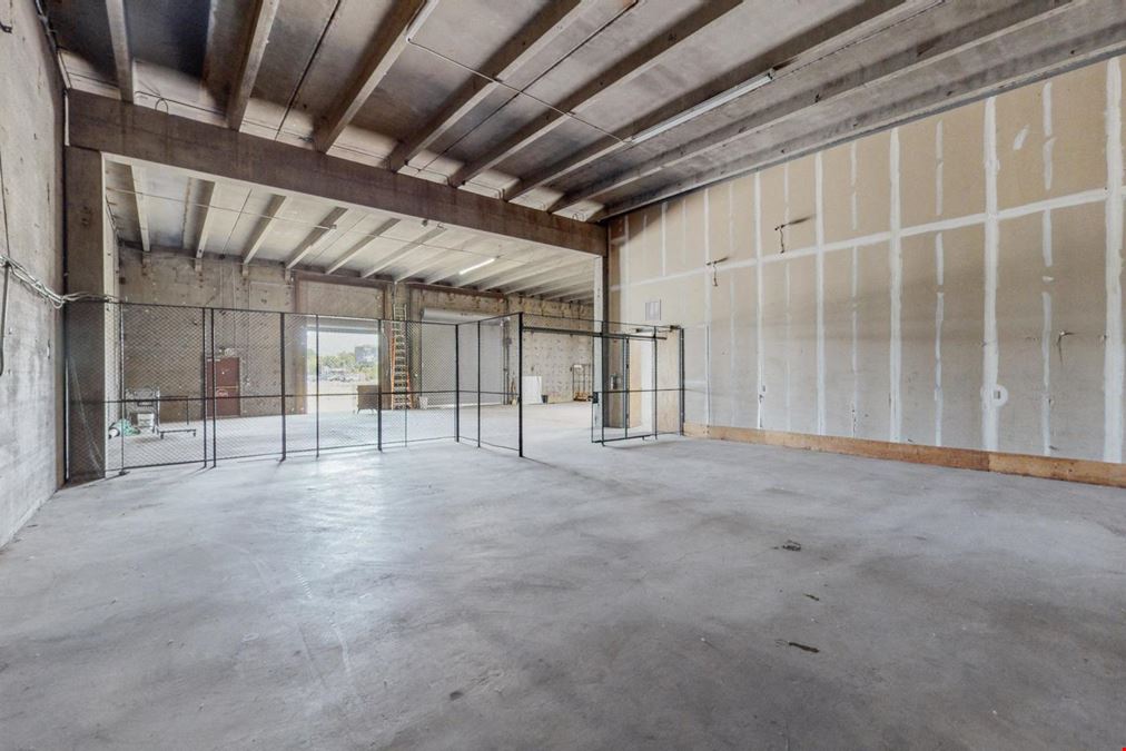 Warehouse Concrete Tilt Up With Gated & Paved Yard with Drive in Door