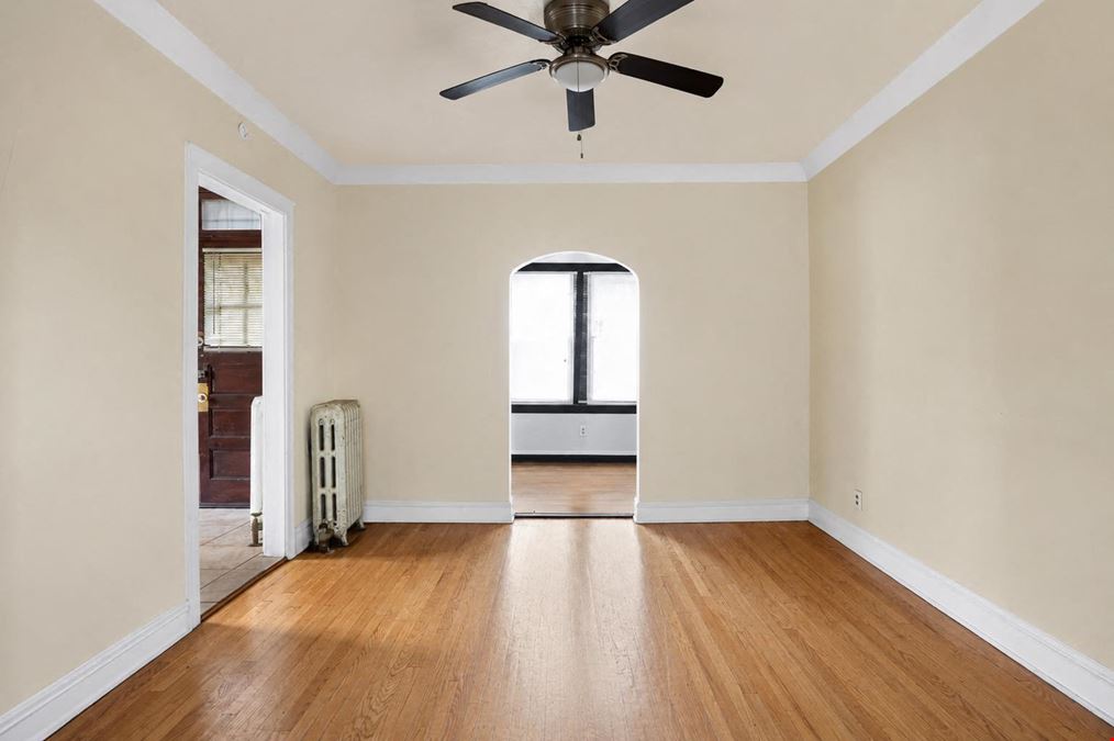 1528 E 74TH PL | 6 Unit Multifamily