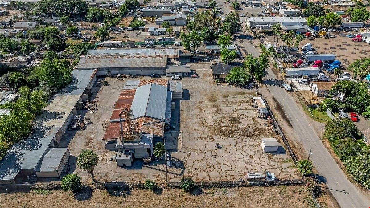 Open Industrial Buildings on 2.14 AC Fenced Land