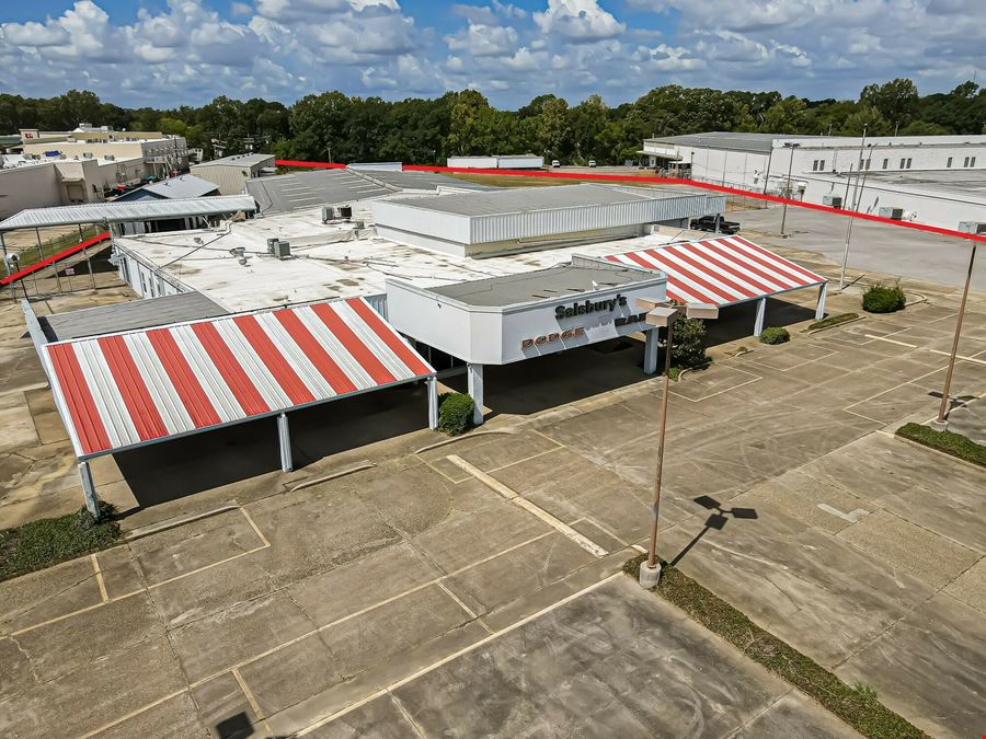 Over 6 Acres of High Traffic Retail Land with +/- 39,582 SF of Bldg.