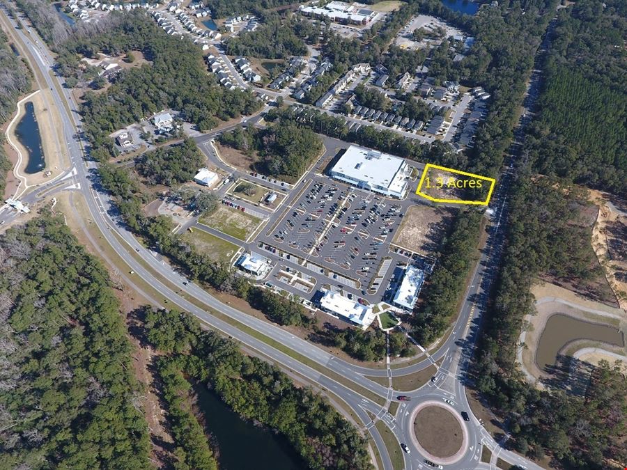 High Profile Commercial Outparcel In Publix Anchored Shopping Center