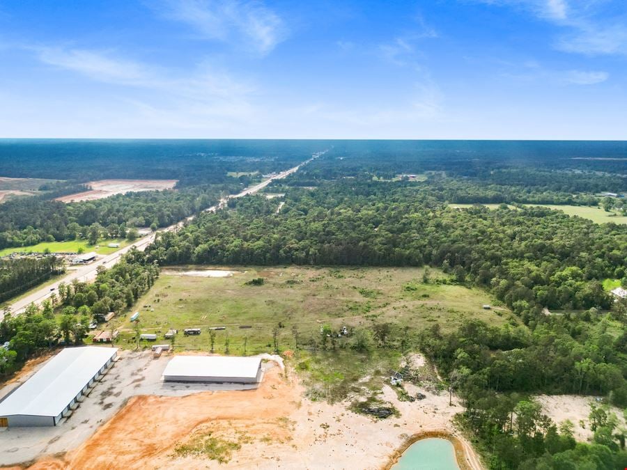 Expansive 23-Acre Tract on High-Traffic Hwy 105 – Prime Development Opportunity with Seller Financing Available