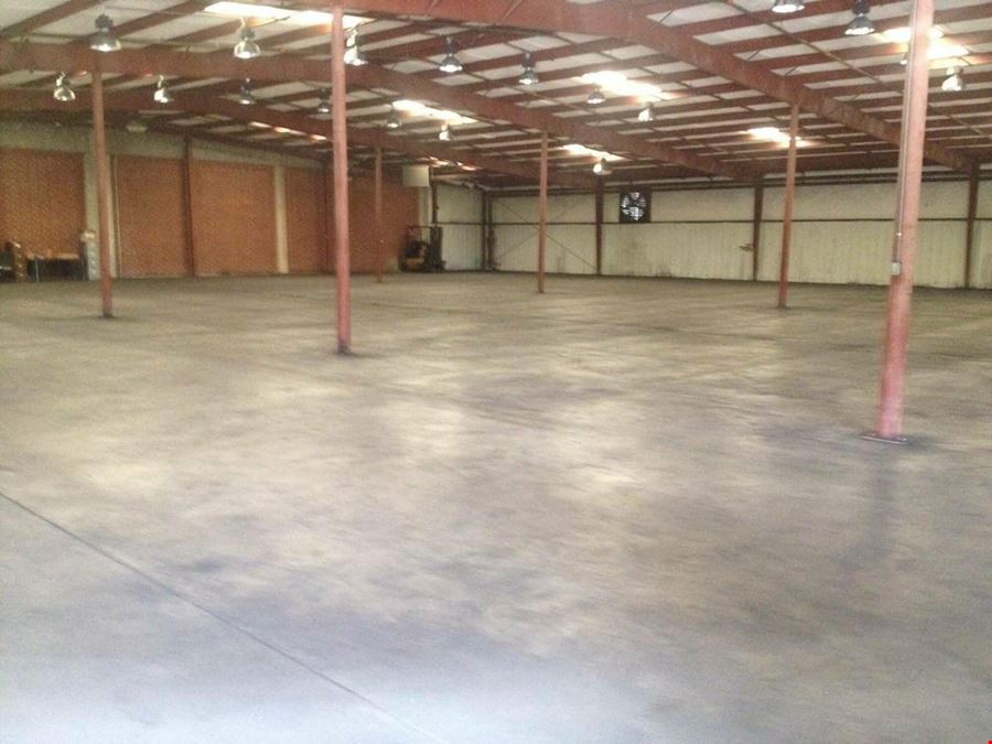 Former Talon Zipper Manufacturing/Warehouse - 105,251 SF - Adjacent to Runway with Potential IOS Land - 20 +/- Acres - Opportunity Zone
