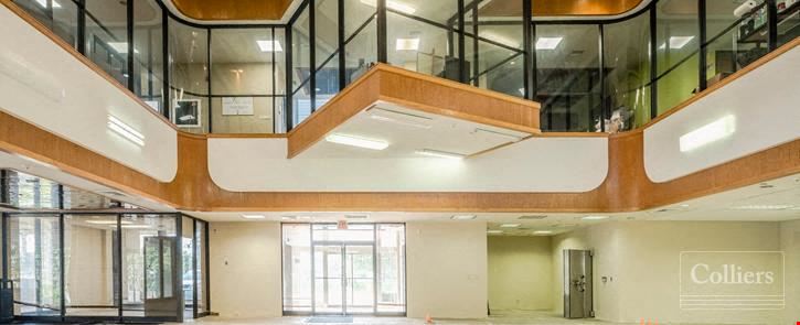 Boutique owner-user office building with oversized balconies and garage parking in North Palm Beach, FL