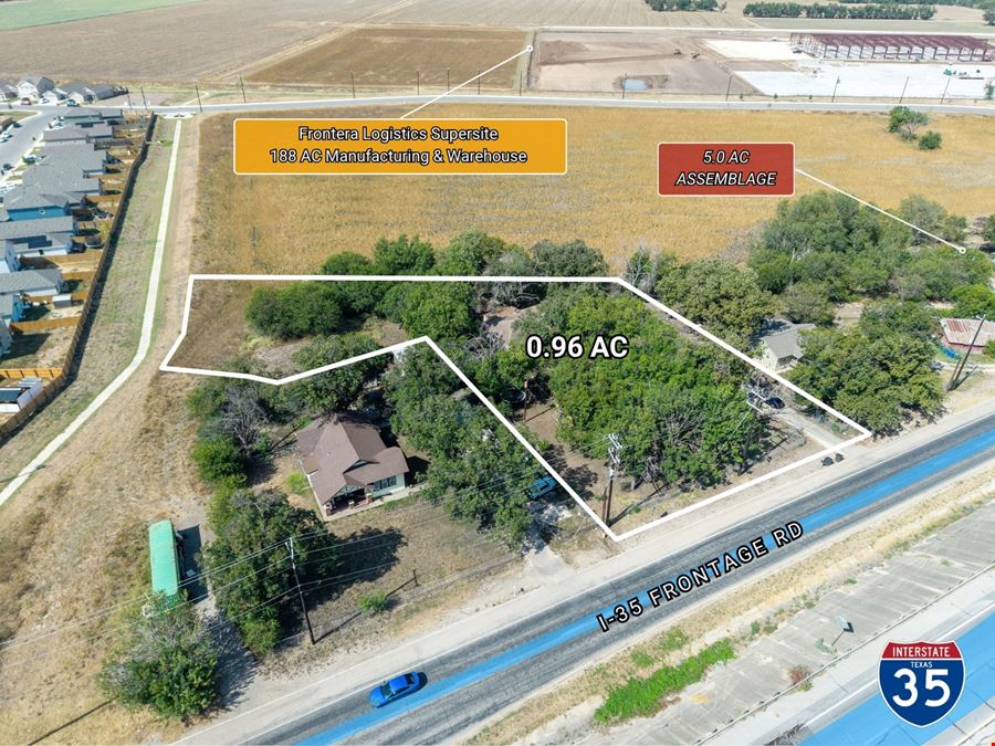 0.96 AC on I-35 South Frontage, Zoned C-3R / I-1, 1,960 SF Building