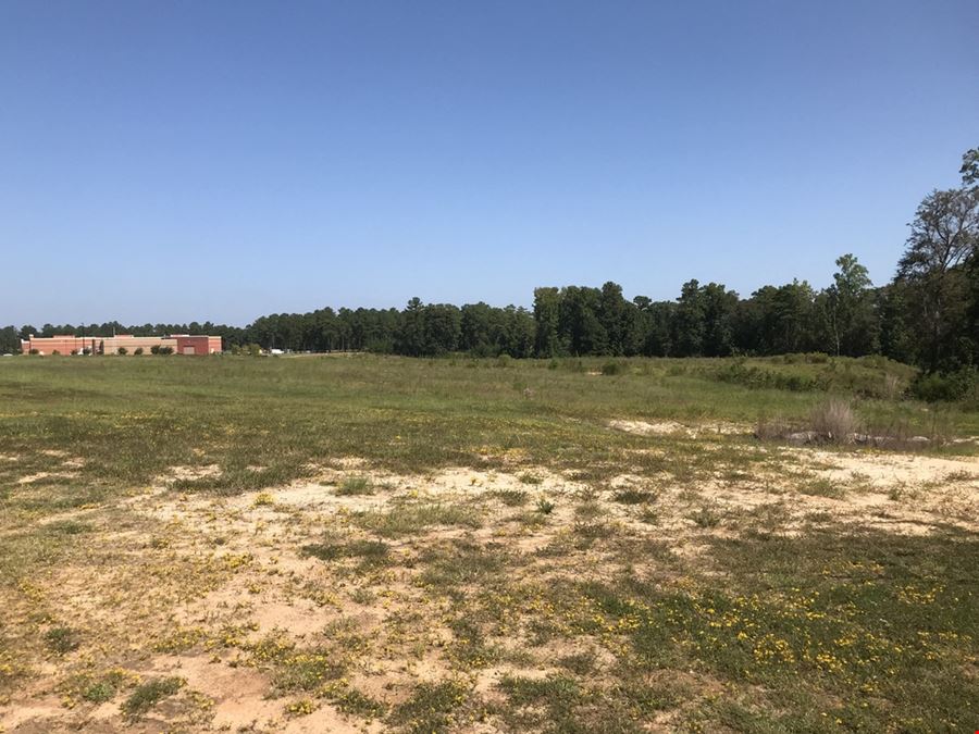 6.7 AC Corner Lot in Military Business Park