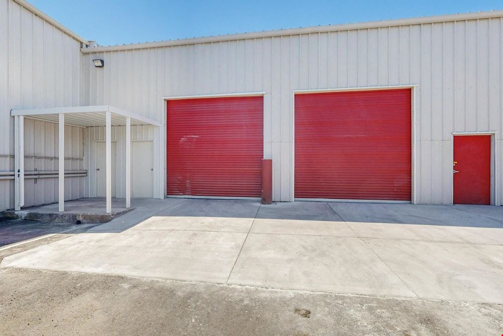 Newly Updated Clearspan Warehouse with Gated & Paved Yard near Big I