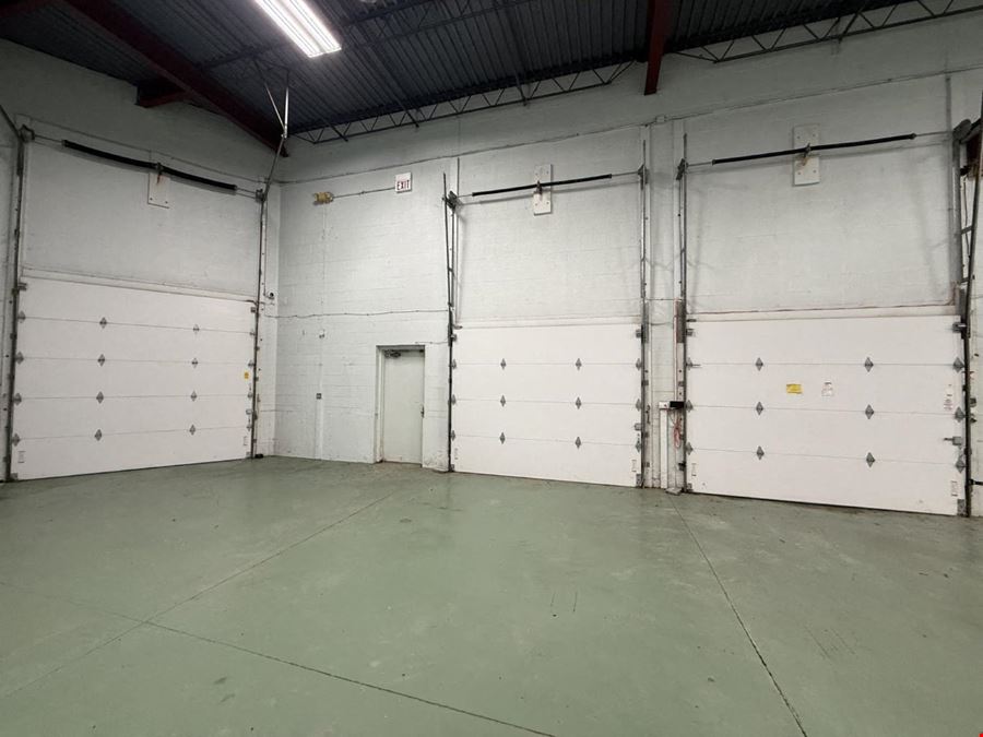 Load under roof: the truck pulls inside the building