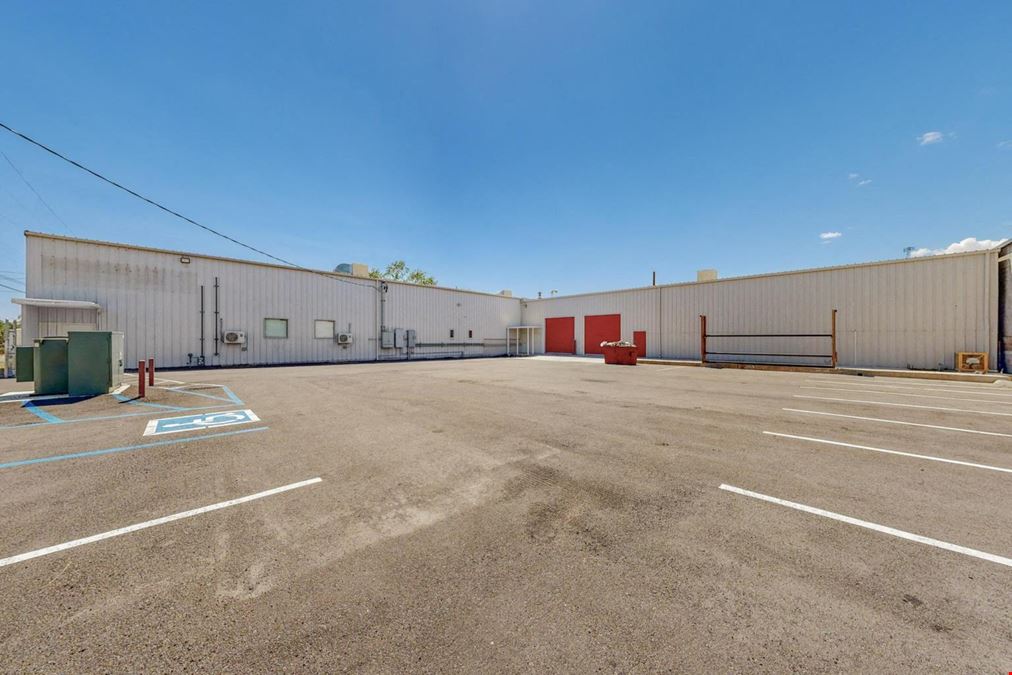 Newly Updated Clearspan Warehouse with Gated & Paved Yard near Big I