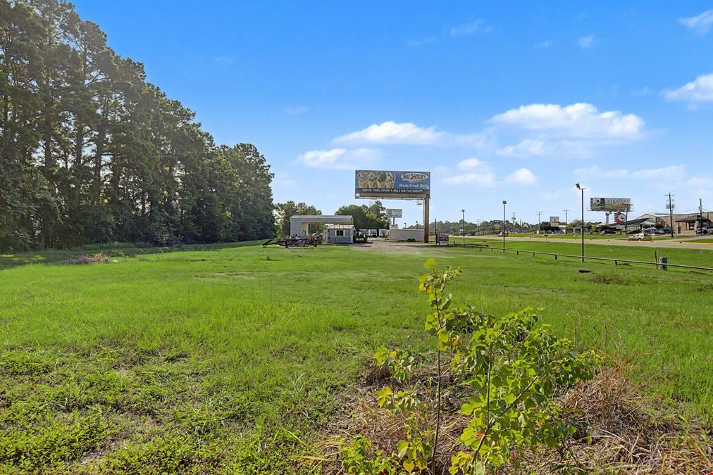 Commercial Investment & Redevelopment Opportunity | Approximately 600' of Highway 105 Frontage | Owner Financing Available