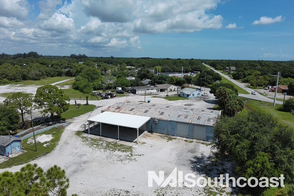 ±7.63 Acres Industrial Land With Metal Warehouse & Office