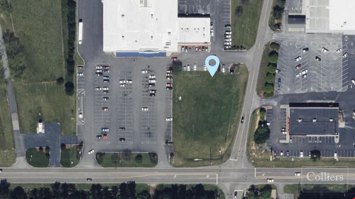 ±0.91-Acre Outparcel Opportunity in a Grocery Anchored Shopping Center
