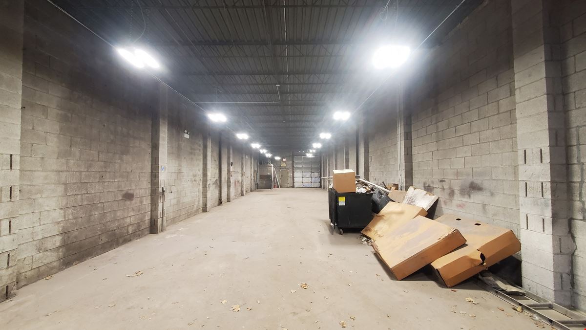 Prime North Center Retail Front + Dual Drive-In Warehouse/Garage