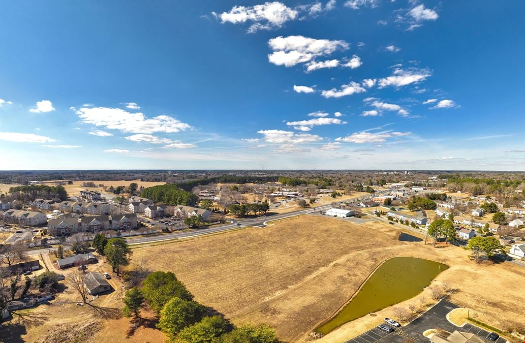 7.99 Acres C-1 Development Land at Lighted Intersection