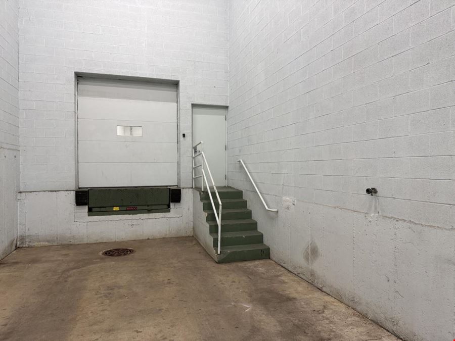 Load under roof: the truck pulls inside the building