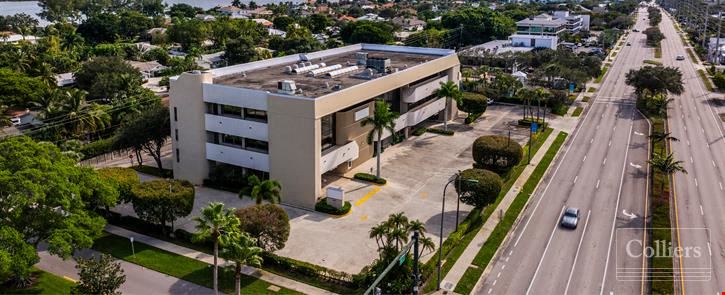 Boutique owner-user office building with oversized balconies and garage parking in North Palm Beach, FL