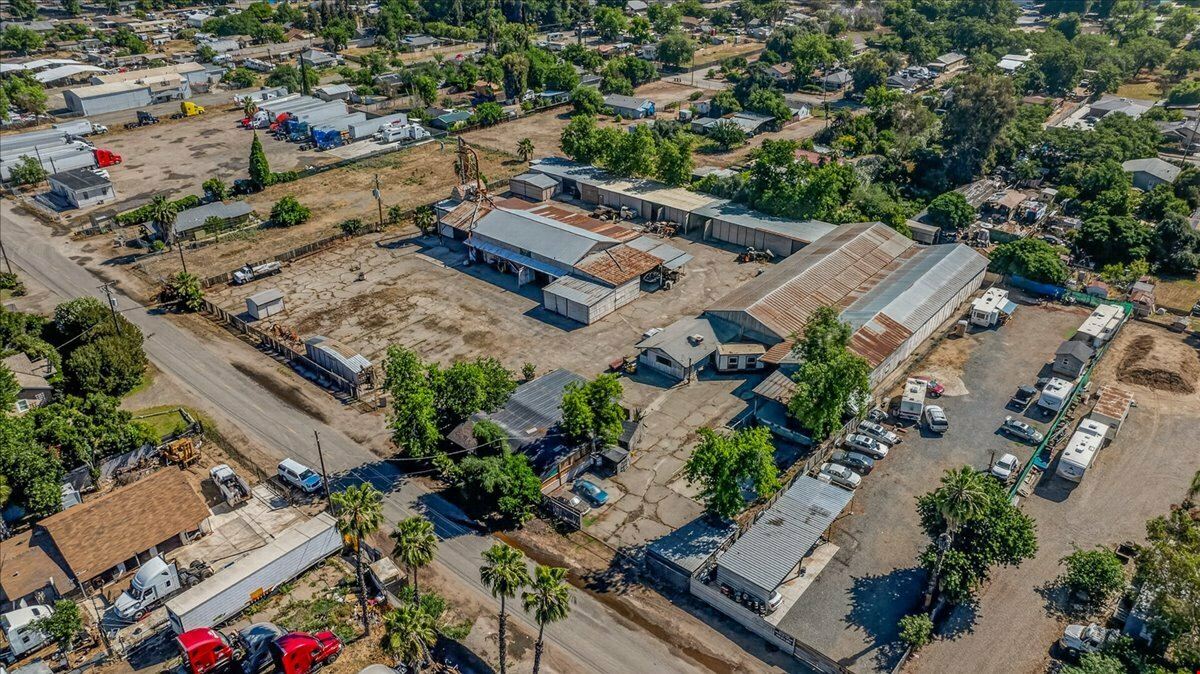 Open Industrial Buildings on 2.14 AC Fenced Land