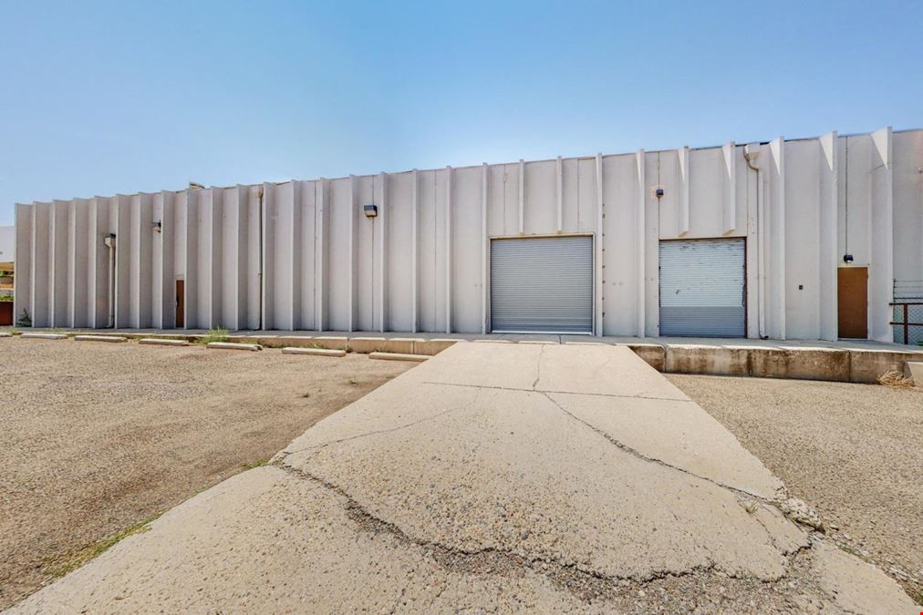 Warehouse Concrete Tilt Up With Gated & Paved Yard with Drive in Door