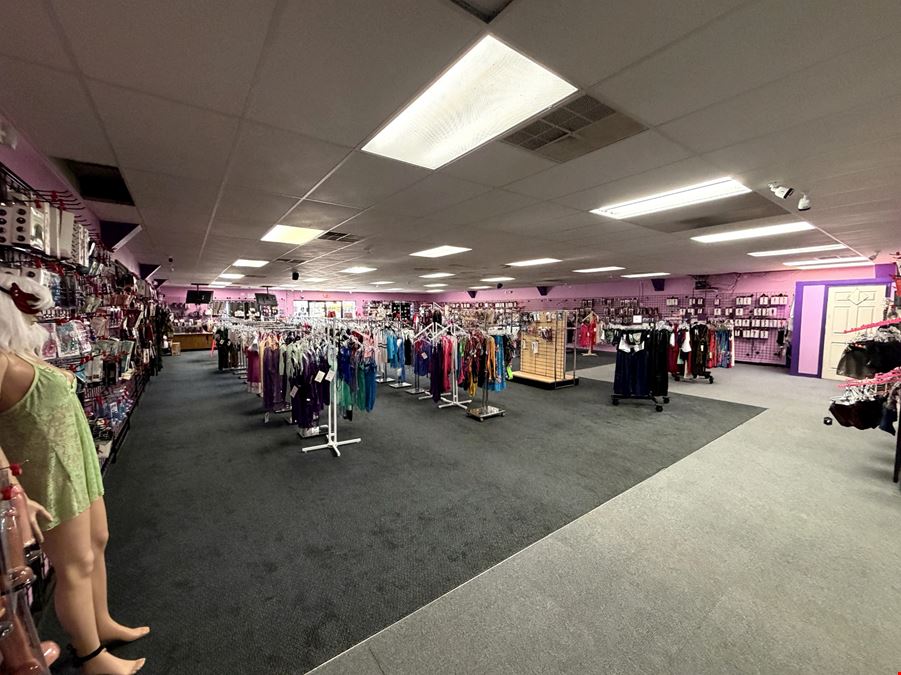 Retail Property with Open Showroom Near Hy-Vee For Sale