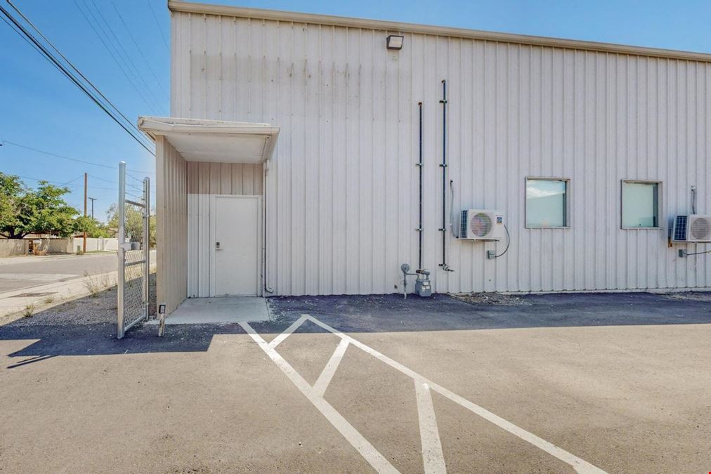 Newly Updated Clearspan Warehouse with Gated & Paved Yard near Big I