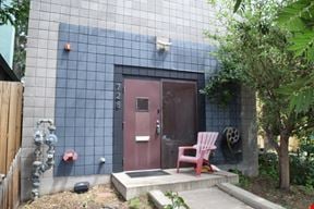 1,500 SF free-standing office/warehouse with small yard.