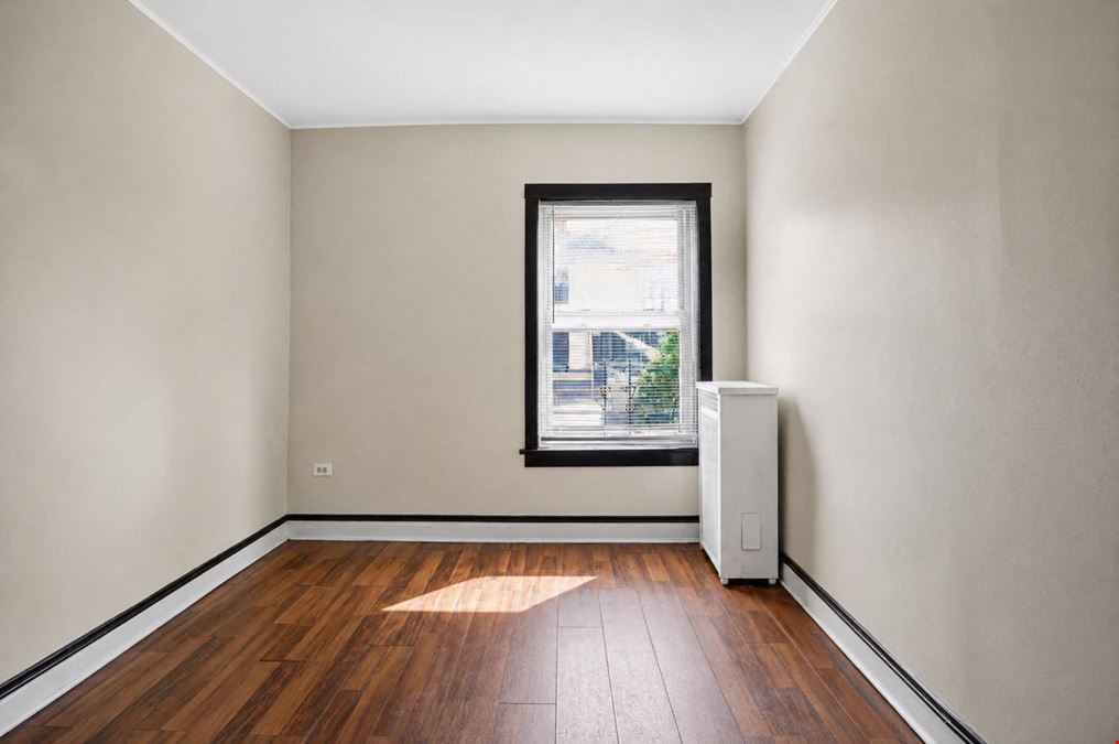 1528 E 74TH PL | 6 Unit Multifamily