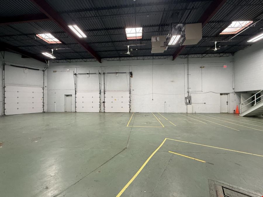 Load under roof: the truck pulls inside the building