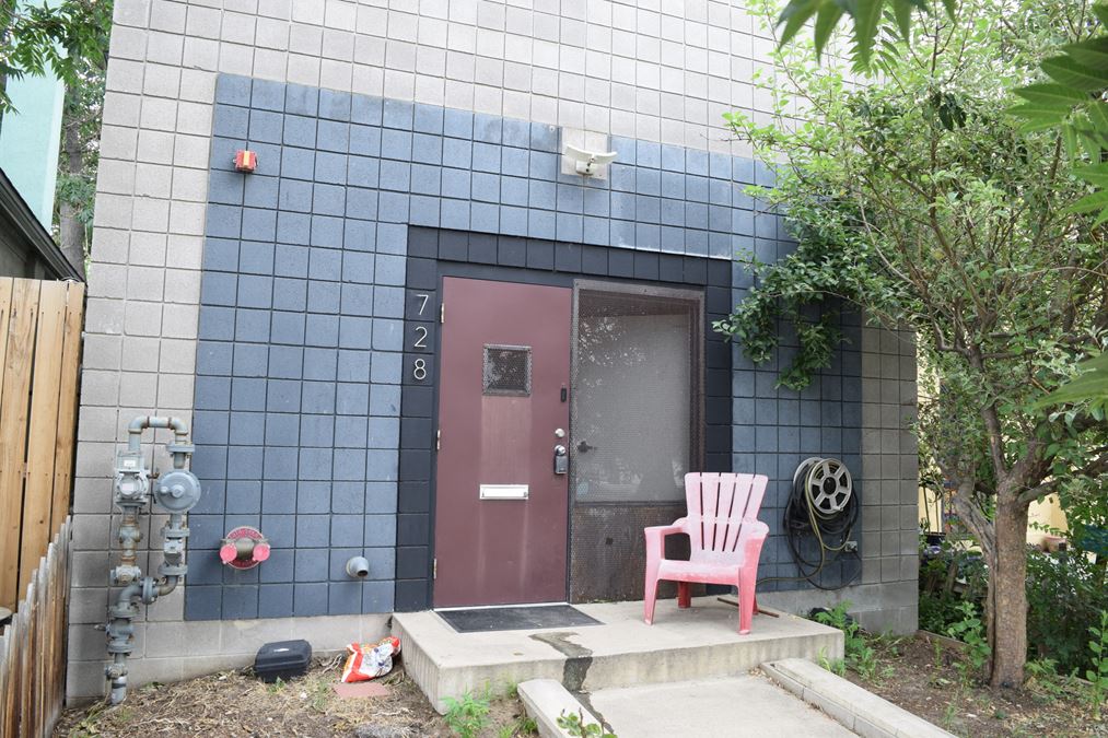 1,500 SF free-standing office/warehouse with small yard.