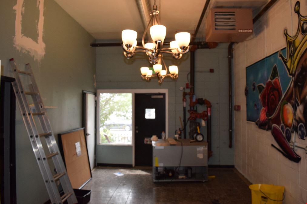 1,500 SF free-standing office/warehouse with small yard.