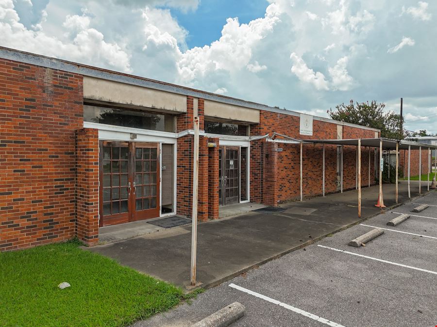 Versatile Commercial Building on ±3.4 Acres with Development Potential