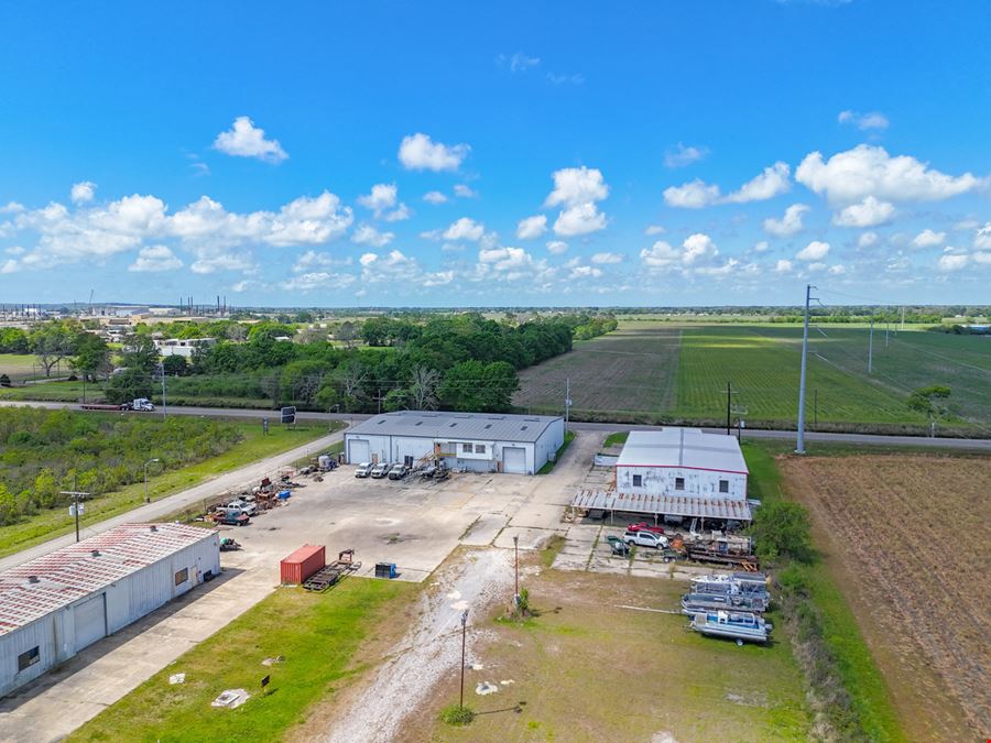 Dual Warehouses Near Hwy 90 with Surplus Land and Office
