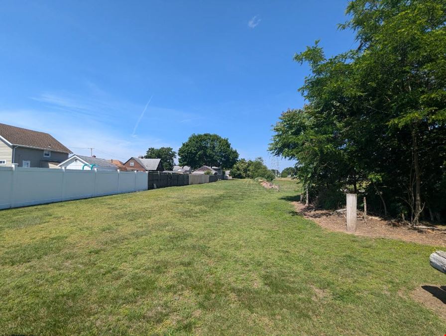 Versatile Industrial Property with Extra Lot – 21 Pommenville St, Pawtucket, RI  02861 & lot 927 Campbell St 