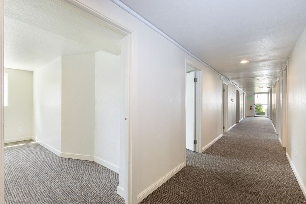 High-Visibility Corner Three-Story Victorian Office