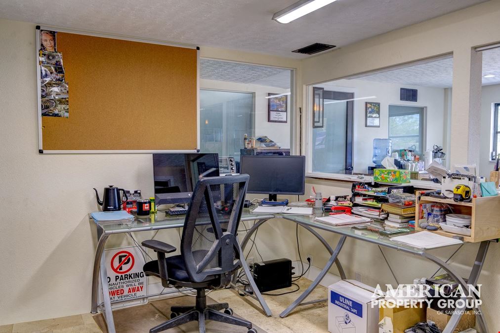Corner Lot Industrial Property with Showroom, Office, and Yard