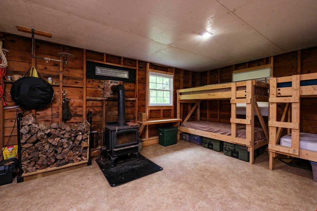 ADJOINING NATIONAL FOREST - 54.5 ACRE OFF-GRID MOUNTAIN RETREAT W/ CABIN