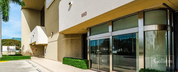 Boutique owner-user office building with oversized balconies and garage parking in North Palm Beach, FL