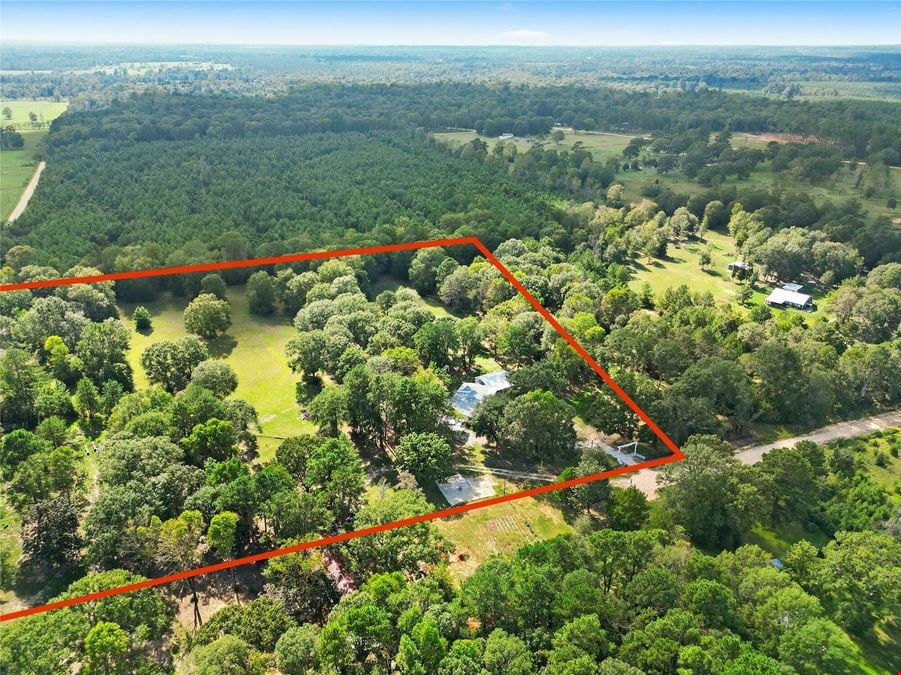 7.3 Acres with 2 homes in Willis, TX