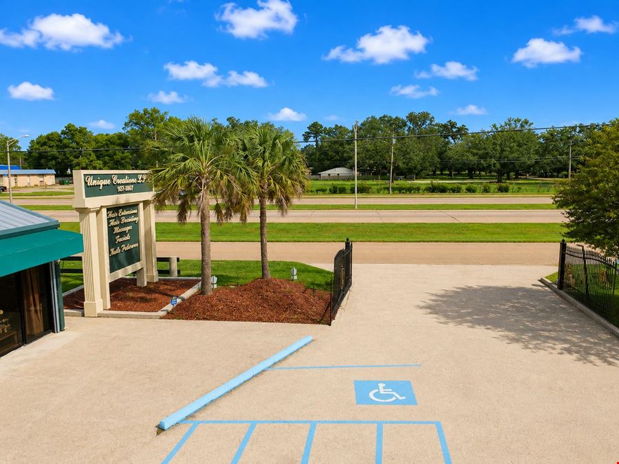 Multi-Tenant Retail/Strip-Center Opportunity with Room for Expansion