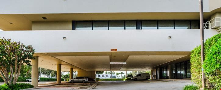 Boutique owner-user office building with oversized balconies and garage parking in North Palm Beach, FL