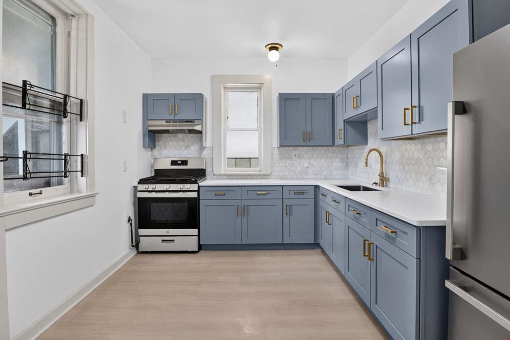 1528 E 74TH PL | 6 Unit Multifamily