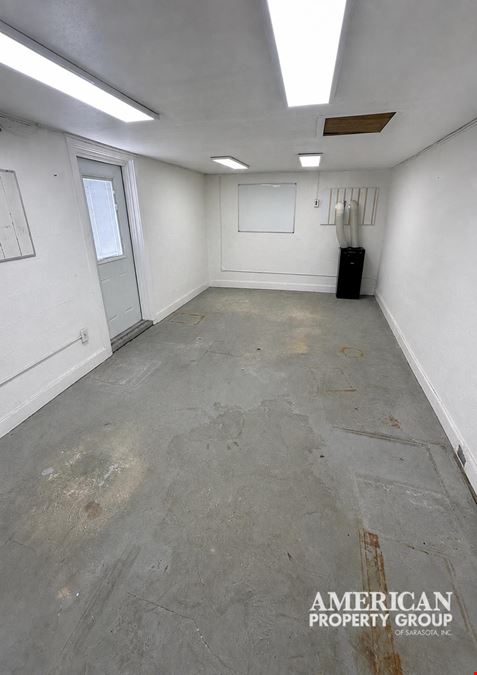 Freestanding Commercial Building with Fenced Land in Downtown Englewood