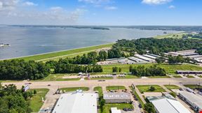 Commercial Investment & Redevelopment Opportunity | Approximately 600' of Highway 105 Frontage | Owner Financing Available