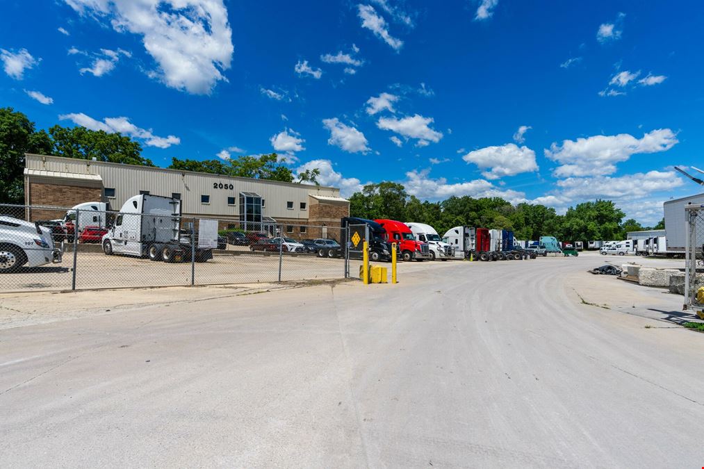 Industrial Facility with Office Space & Fleet Storage & 11.8± AC Dev. Site