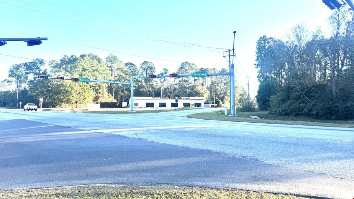 7998 Mobile Hwy | Signalized Hard Corner For Sale