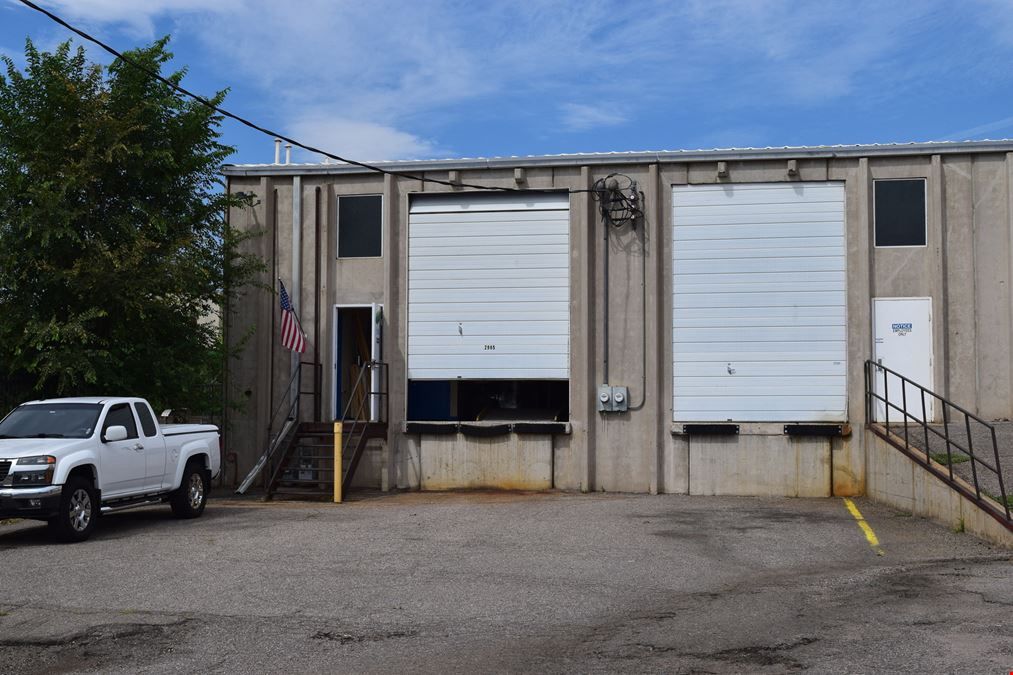 2,000 SF warehouse with dock high loading (drive in access potential)
