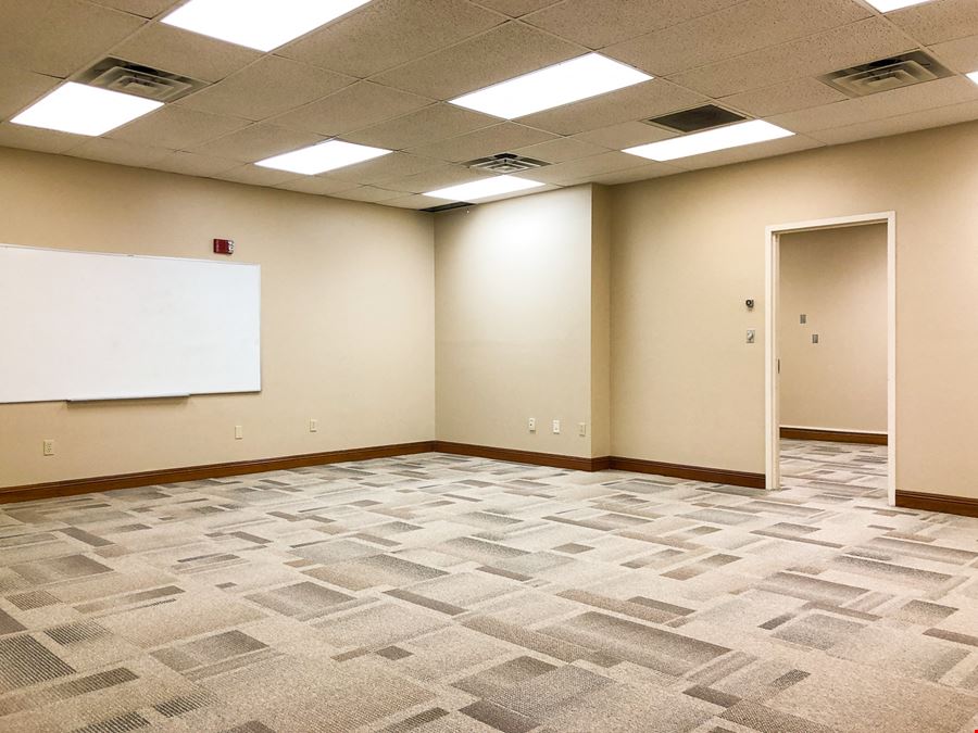 New Price: Gras Town Plaza - Office Building & Parking Lot in Downtown